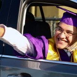 Luis Renteria, bound for Harvard, waves to friends.